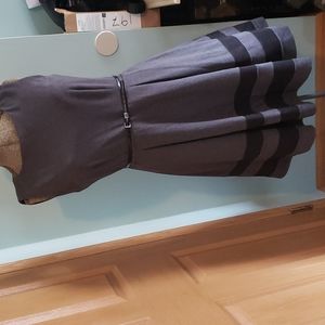 Calvin Klein like new. Zipper in back. Belt. 2 pleats front and back.